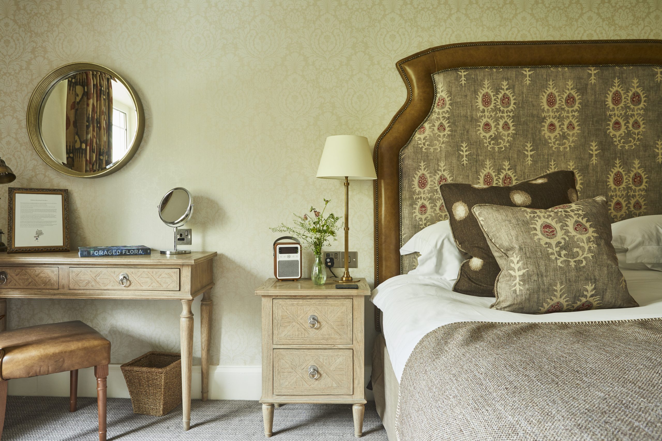 Double bed with seating area for guests