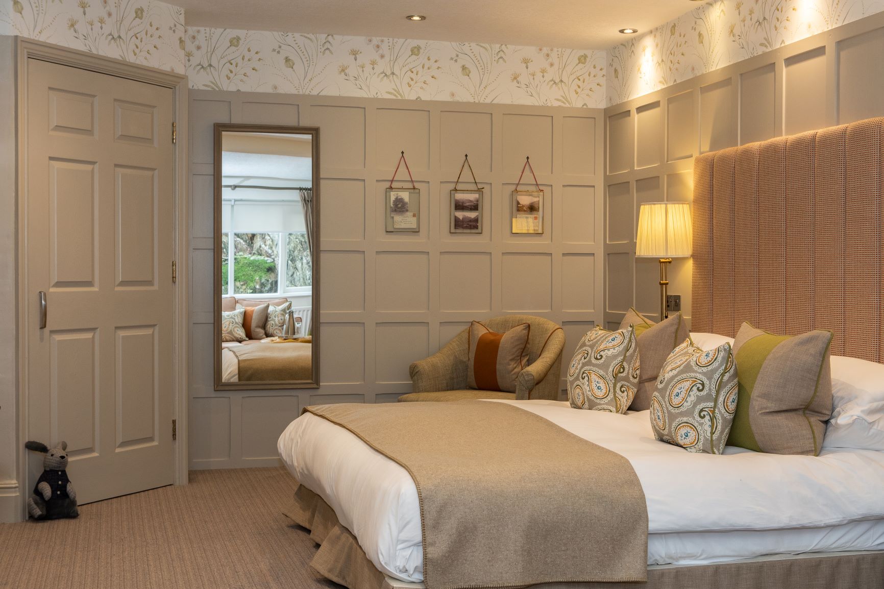 Courtyard room closeup of double bed headboard and cushions