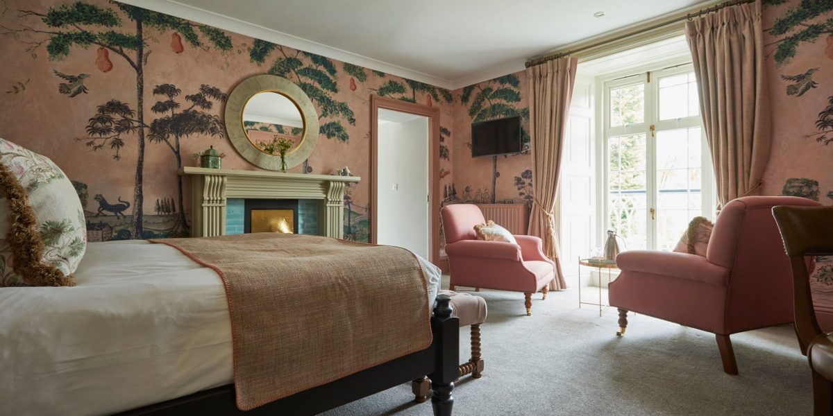 A hot tub surrounded by greenery at the boutique Lake District hotel, Rothay Manor Hotel.